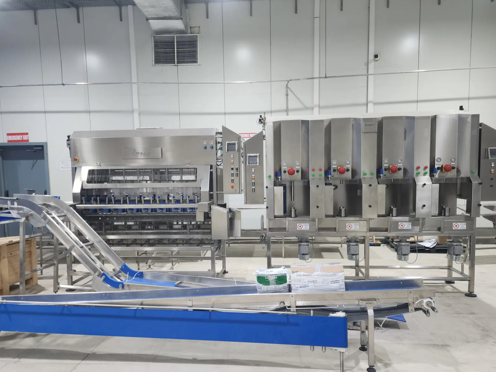 Stainless-steel food processing line in a production facility